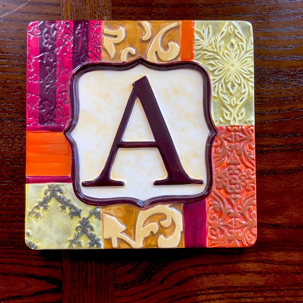 “A” tile